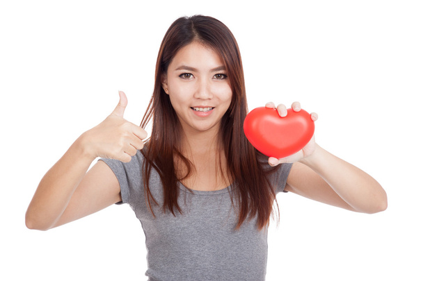 Young Asian woman thumbs up with red heart - Fotografie, Obrázek