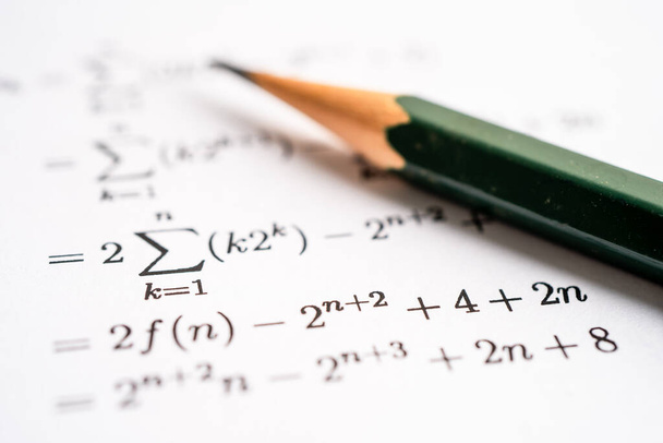Pencil on mathematic formula exercise test paper in education school. - Foto, Bild