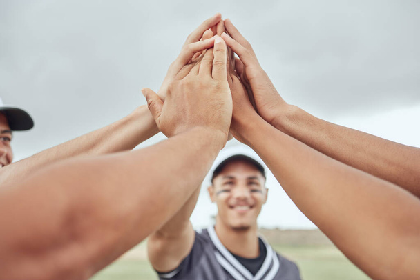 Hands, high five and teamwork in baseball with team players getting ready for training, practice and game. Fitness, inspiration and motivation for sports athlete on baseball field together in support. - Φωτογραφία, εικόνα