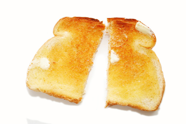 Кусочек обжаренного тоста пополам
 - Фото, изображение