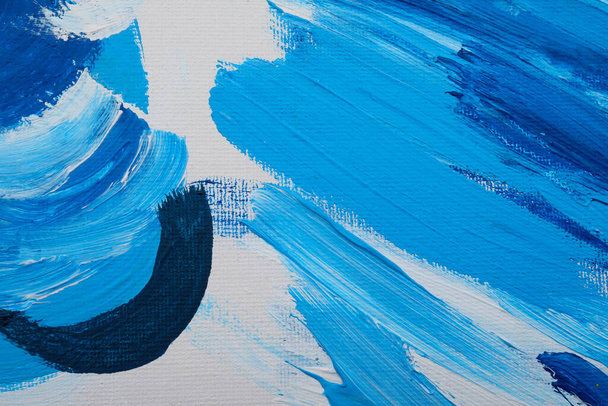 Beautiful strokes of blue oil paints on white canvas as background, closeup - Fotoğraf, Görsel