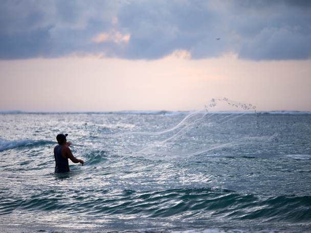 Fisherman on the beach of Kuta in Bali  - Foto, Imagem