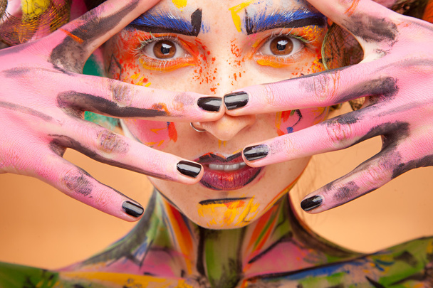 Woman with bright colour face art - Fotoğraf, Görsel