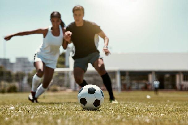 Friends, soccer player and soccer training game on football field for fitness workout on grass outdoor football pitch for body or cardiovascular health. People, soccer ball and summer run in Brazil. - Φωτογραφία, εικόνα