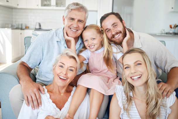 Photo, portrait and big family with smile in their house together in the living room. Happy elderly people with girl child, mother and father for love and happiness in the lounge of their home. - Foto, immagini