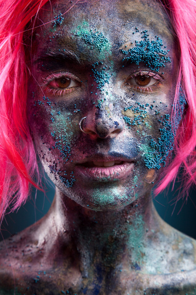 Woman with pink wig hair and face art - Foto, Bild
