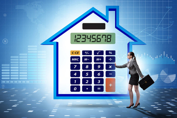 Pojęcie kredytu hipotecznego z kalkulatorem - Zdjęcie, obraz