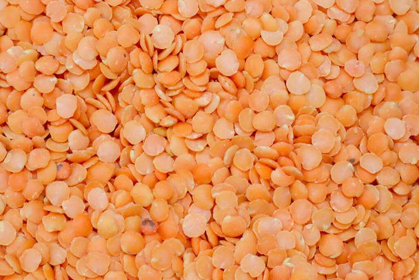 Red lentils, pulses, dried, uncooked, close-up view, background - Φωτογραφία, εικόνα