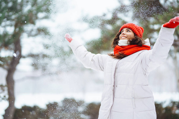 Happy winter woman with snow outdoor. Christmas. - Φωτογραφία, εικόνα