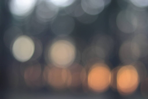 Gold and christmas lights background, blurred yellow garland, bokeh light blur. - Valokuva, kuva