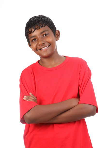 Smiling teenage boy in red t shirt with arms folded - Фото, зображення