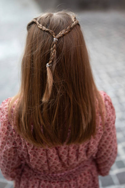rear view of little girl with beautiful hair - Fotografie, Obrázek