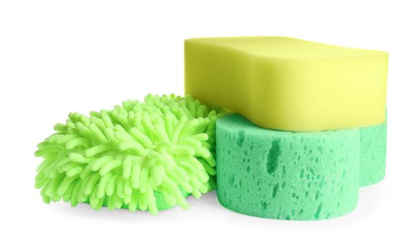 Sponges and car wash mitt on white background - Fotó, kép