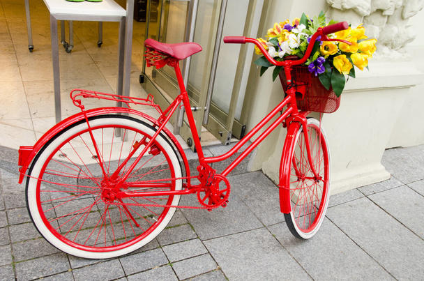 Vintage red bicycle in the street - Photo, Image