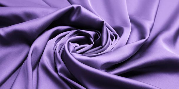 Delicate violet silk fabric as background, closeup view - Foto, imagen