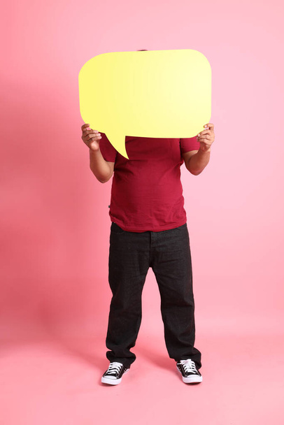 The 40s adult overweight Asian man standing on the pink background. - Foto, afbeelding