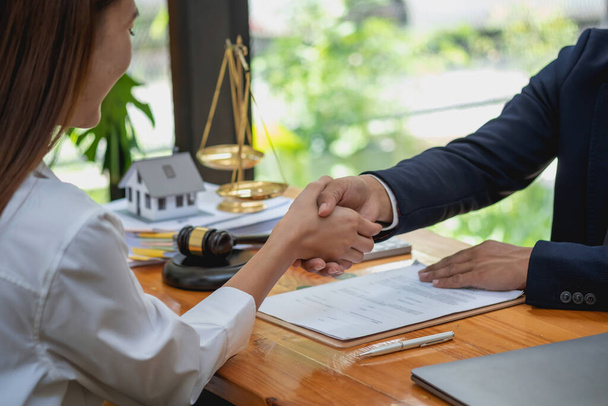 Law, Counsel, Agreement, Contract, Lawyer, advising on litigation matters and shaking hands in contracts as lawyers to receive complaints from clients. concept lawyer - 写真・画像