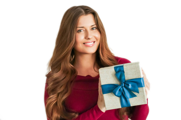 Christmas holiday present, happy woman holding a gift or luxury beauty box subscription delivery isolated on white background, portrait - Foto, immagini
