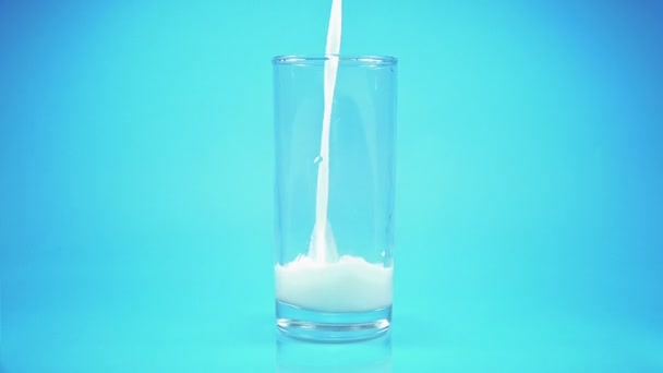 Glass of Milk with Pouring Splash - Video, Çekim