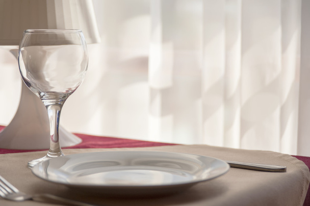 Cutler - glass, plate, fork on the table - Foto, Imagen