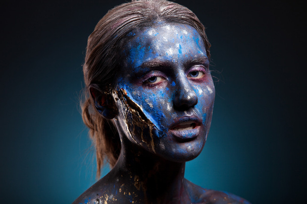 Blue face art woman with scar on face - Photo, Image