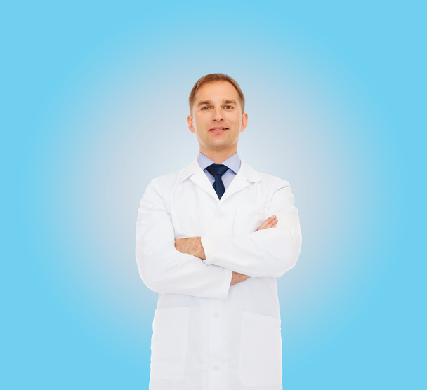 smiling male doctor in white coat - Zdjęcie, obraz