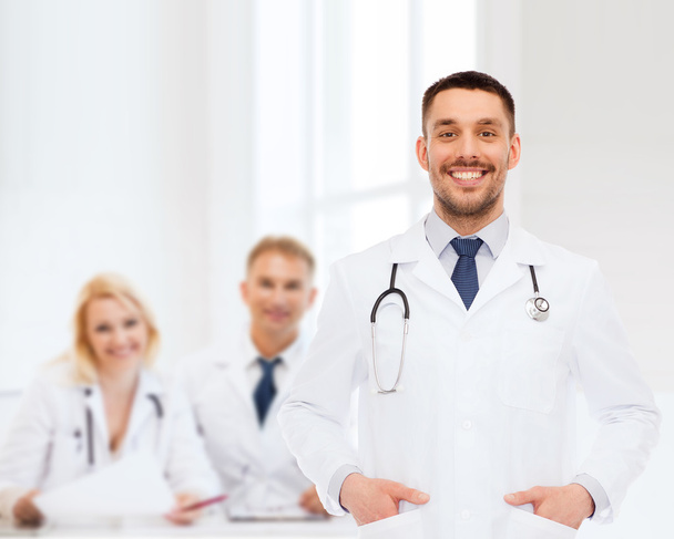 smiling male doctor with stethoscope - Foto, Imagen