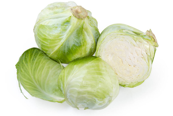 Whole head of the late white cabbage, two halves of the same head and separate cabbage leaf on a white background - Photo, Image