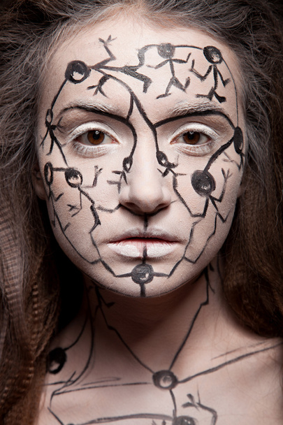 Vrouw met creatieve gezicht kunst - Foto, afbeelding