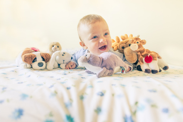 Baby and toys - Foto, Bild
