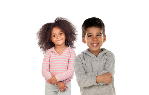 Различные дети, смотрящие в камеру на белом фоне  - Фото, изображение