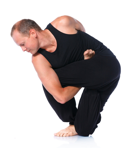 Man doing yoga - Fotó, kép
