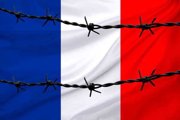 national flag of france on textured background, rows of barbed wire, concept of war, revolution, armed uprising in country, increase in crime in state, terrorist attack, redistribution of power - 写真・画像