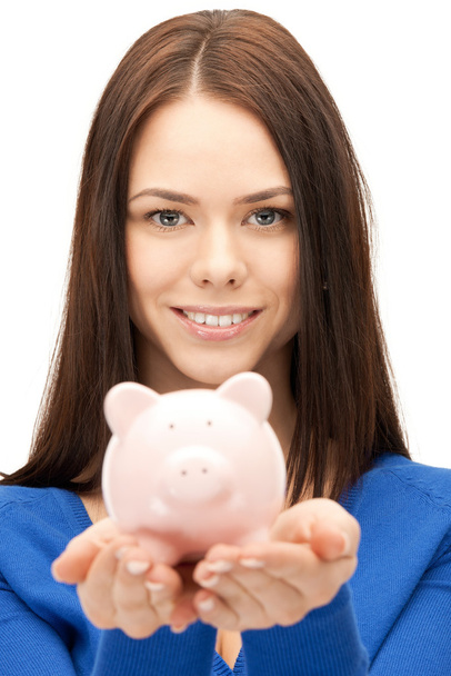 Lovely woman with piggy bank - Фото, зображення