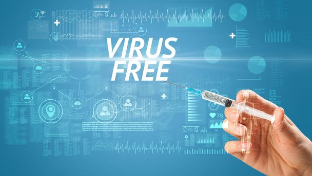 Syringe needle with virus vaccine and VIRUS FREE inscription, antidote concept - Valokuva, kuva