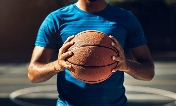 Basketball player, man hands and ball in basketball court, outdoor training or sports goals competition game, champion workout and fitness. Closeup basket ball athlete coach in community playground. - Foto, Imagem