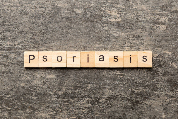 Psoriasis word written on wood block. Psoriasis text on table, concept. - Foto, immagini