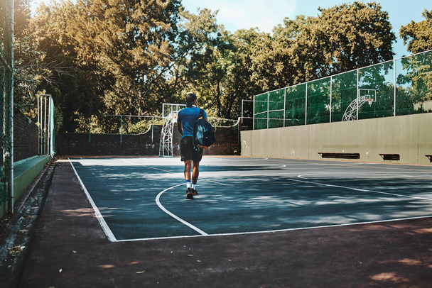 Man, basketball court or athlete in fitness, workout or training for Colombian game, match or competition. Basketball player, sports person or student in community, campus or school exercise practice. - Photo, Image