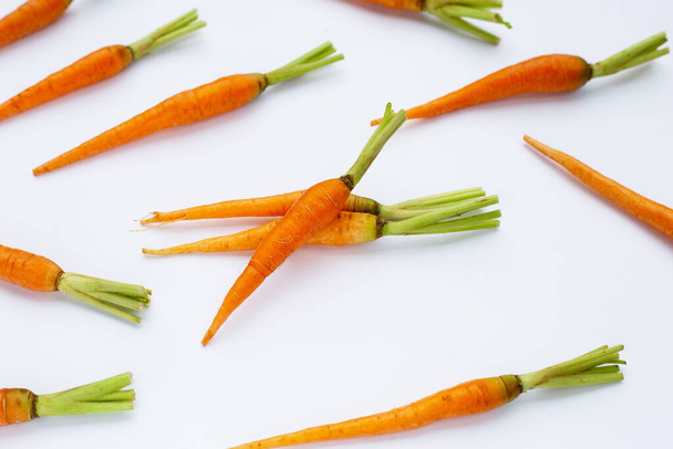 Fresh carrots on white background. - Foto, Bild
