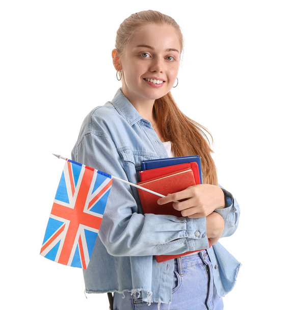 Young woman with UK flag and books on white background - Foto, imagen