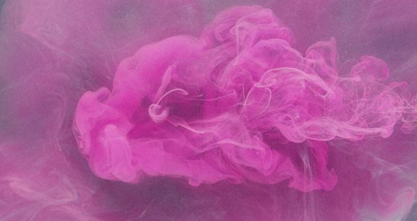 Ink water drop. Color smoke banner. Bright splash. Neon pink paint flow on purple glitter mist cloud abstract copy space background. - Фото, зображення