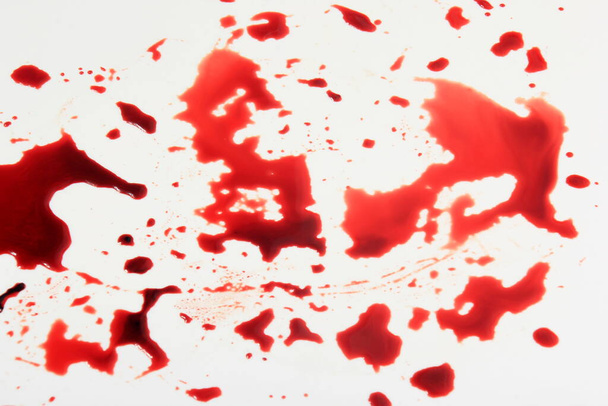 Red Blood splashed isolated on white background - Фото, изображение