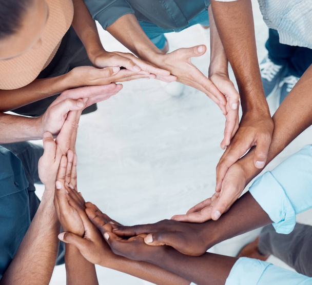 Teamwork, collaboration and circle of synergy hands, support and solidarity of trust, goals and team building mission. Above workflow group, diversity and network of community, connection and world. - Photo, Image