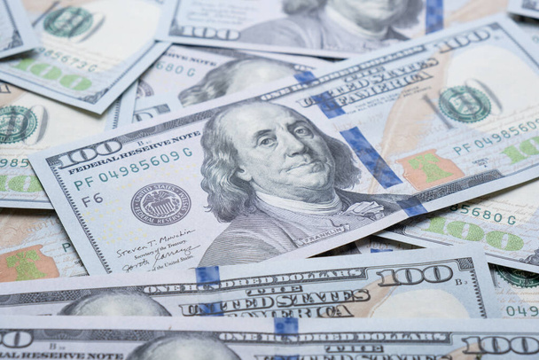 Texture of dollar bills. One hundred dollars. Close-up, macro. - Fotografie, Obrázek