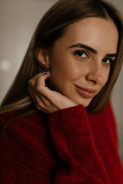 Crop close up portrait of young attractive dark-eyed woman look at camera posing. Smiling millennial beautiful female show healthy glowing soft face skin. Cosmetology concept. - Fotoğraf, Görsel