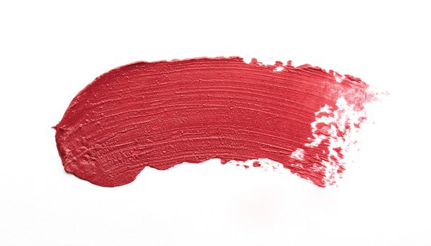 Acidente vascular cerebral de batom de cor vermelha no papel branco
 - Foto, Imagem
