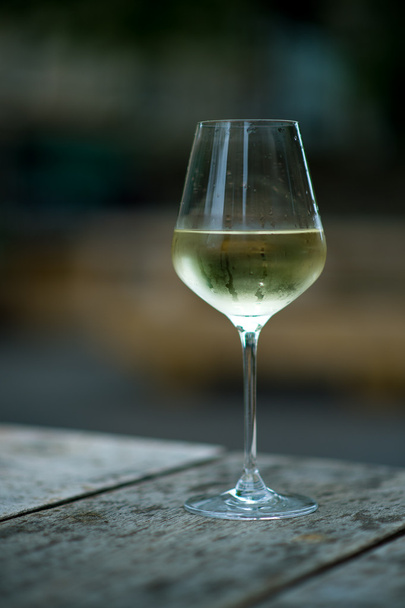 color image of chilled white wine in a glass , with copy space - Photo, Image