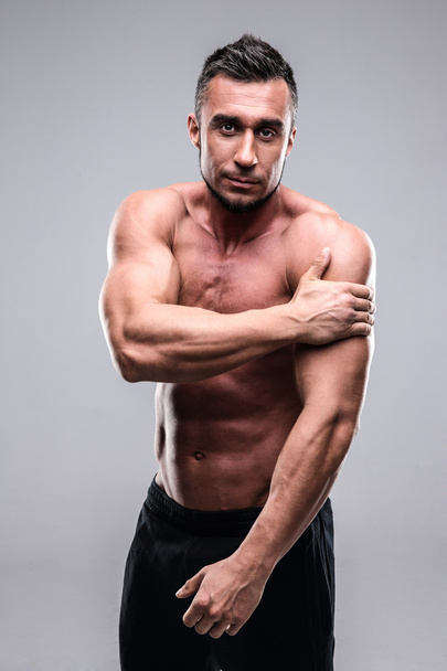 Handsome muscular man isolated - Photo, Image