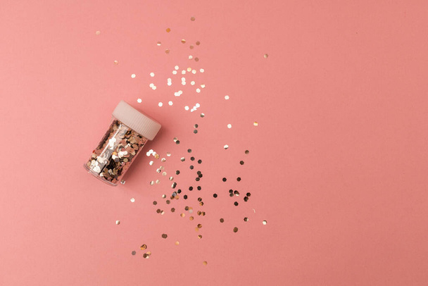 Jar of glitter on a pink background, glitter for eyes and hands - Photo, Image