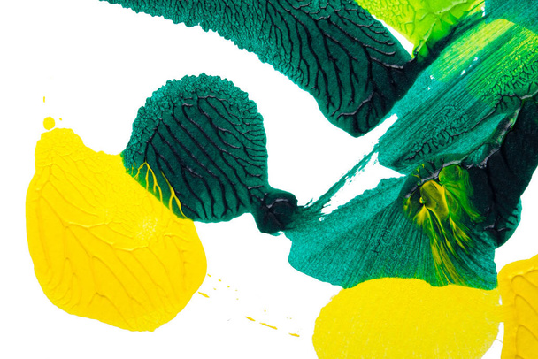vert jaune et brun abstrait peinture acrylique texture de couleur sur fond de papier blanc en utilisant la méthode de tache d'encre rorschach - Photo, image
